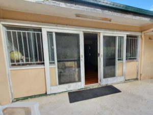 White timber and glass doors with windows